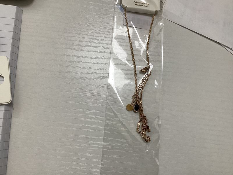 Black oval pendant necklace