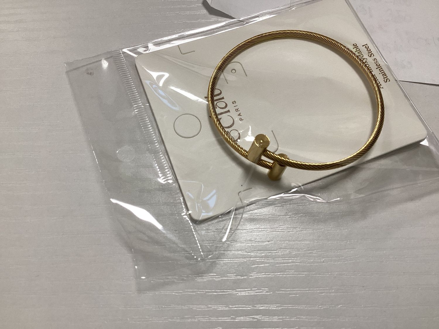 Gold H bracelet