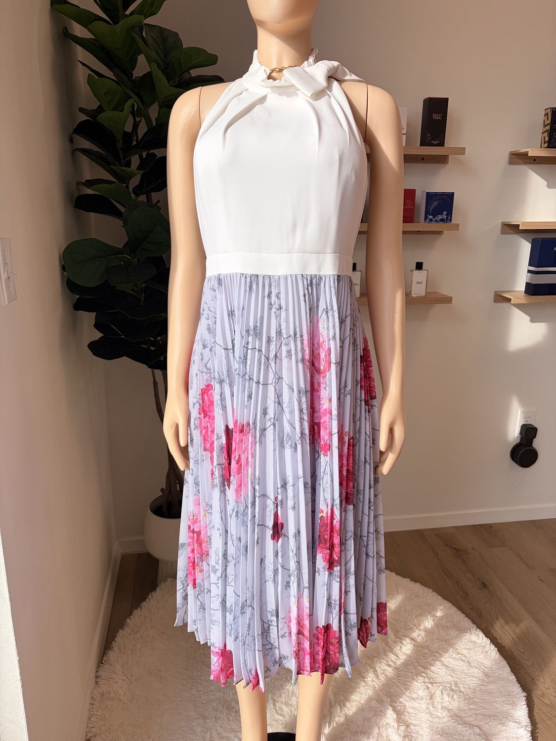 sleeveless pleated floral midi dress
