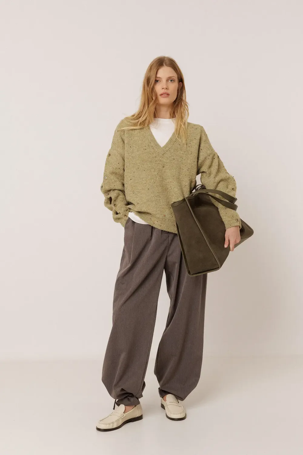 Pullover Hellgrün, mit Ärmel-Knopfreihe Pullover Hellgrün, mit Ärmel-Knopfreihe