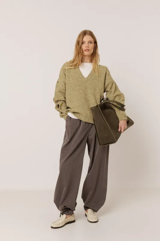 Pullover Hellgrün, mit Ärmel-Knopfreihe Pullover Hellgrün, mit Ärmel-Knopfreihe
