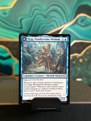 Sygg, Wanderwine Wisdom // Sygg, Wanderbrine Shield  (ECL)