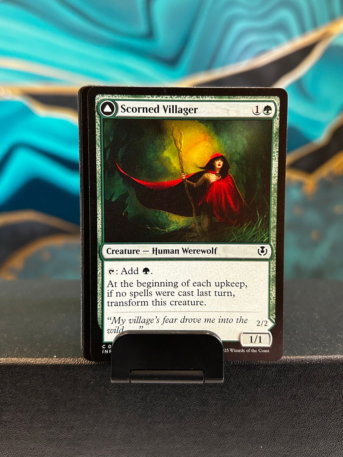 Scorned Villager // Moonscarred Werewolf  (INR)