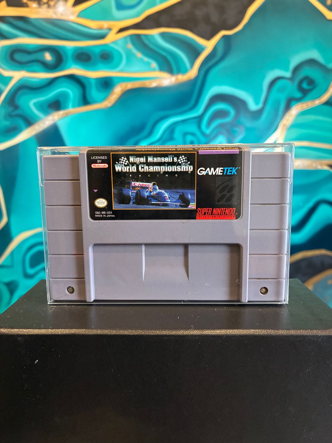Nigel Mansell's World Championship Racing  (SNES)