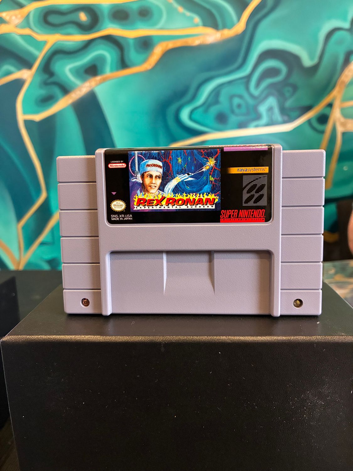 Rex Ronan Experimental Surgeon  (SNES)