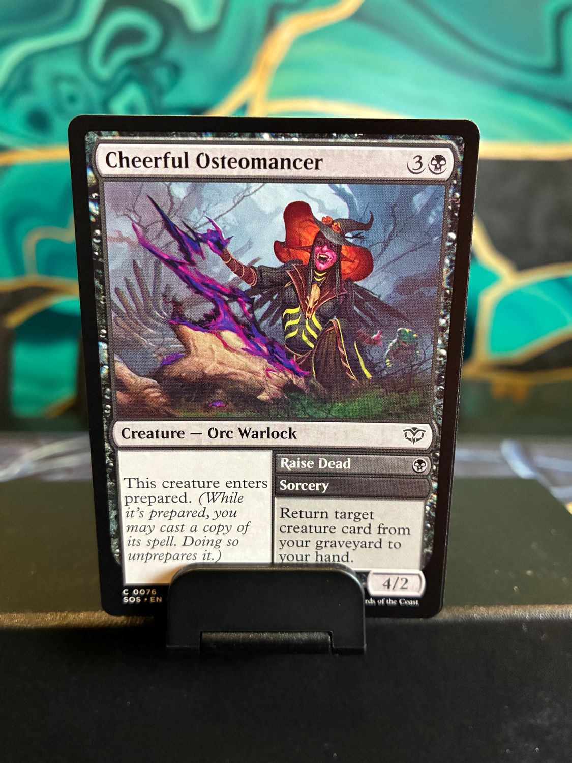 Cheerful Osteomancer // Raise Dead  (SOS)