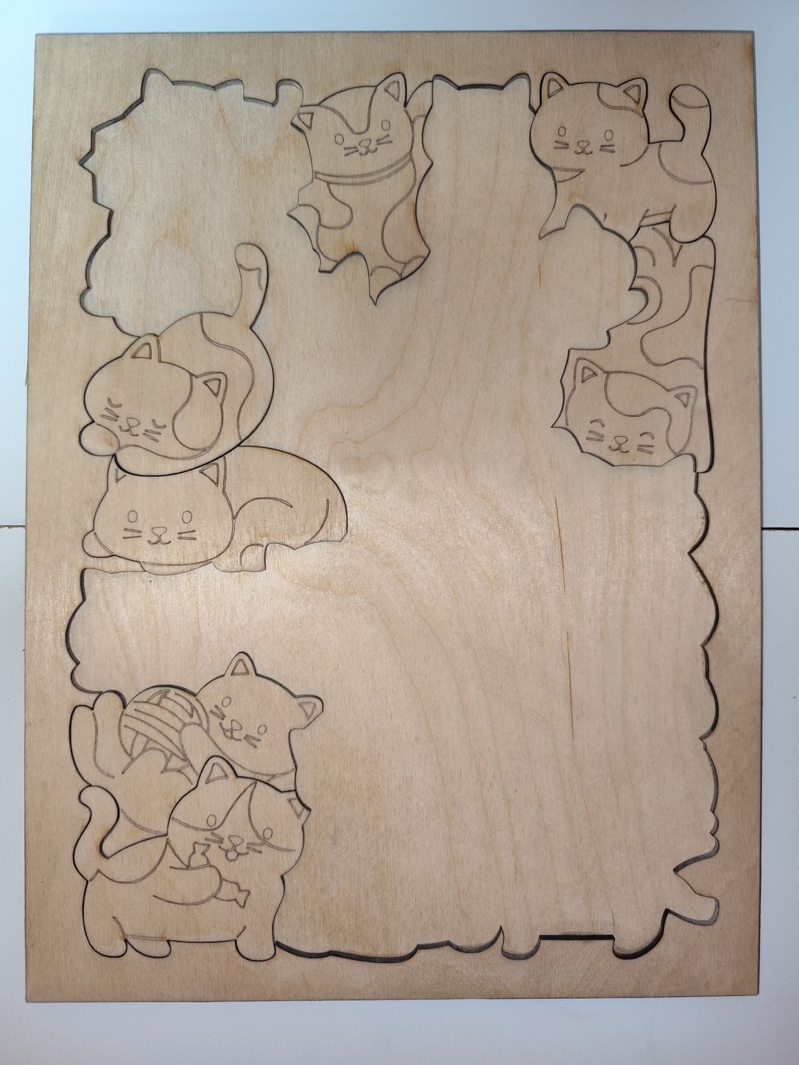 Puzzle dla dzieci Koty – drewniane, do malowania, 22 el. + ramka