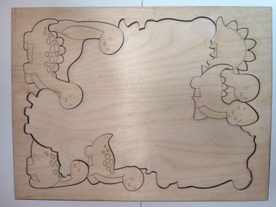 Puzzle dla dzieci Dinozaury – drewniane, do malowania, 22 el. + ramka