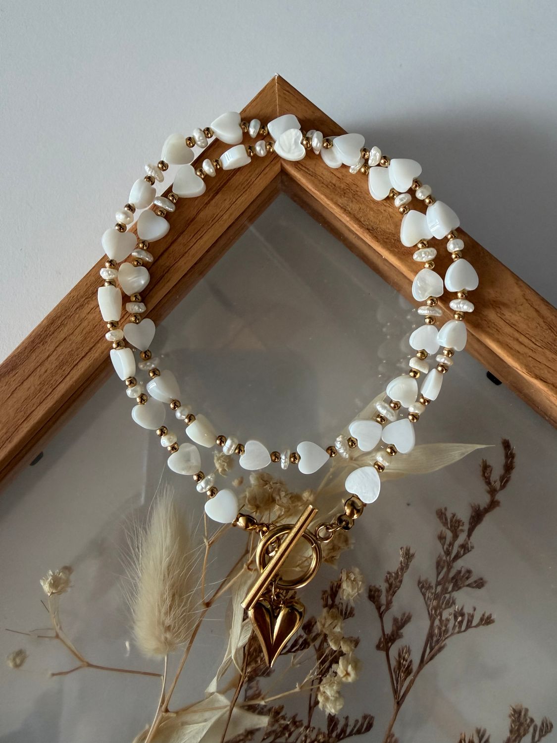 Naszyjnik białe serduszka masa perłowa