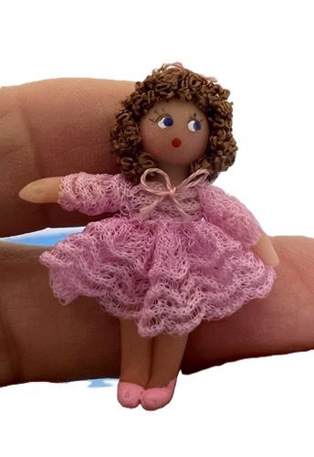 1 1/2" Tall Doll Dressed in Pink nc0382