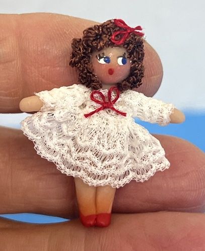 1 1/2" Tall Doll Dressed in White nc0381