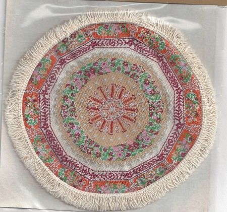 6" round rug with fringed edge 12m04