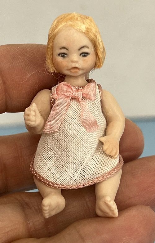 Baby Girl in Jumper with Pink Trim mc05741