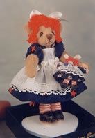 Ann Bear Holding Doll womb890