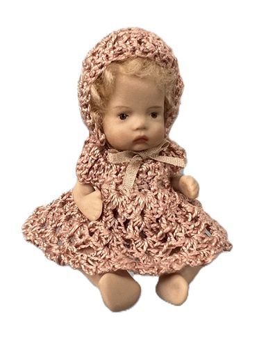 Blonde baby in pink crochet outfit ps007