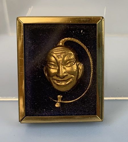 Brass Smiling Oriental Face with Braided Hair MC04569