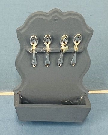 Blue Spoon Display with Silver Spoons mc05954