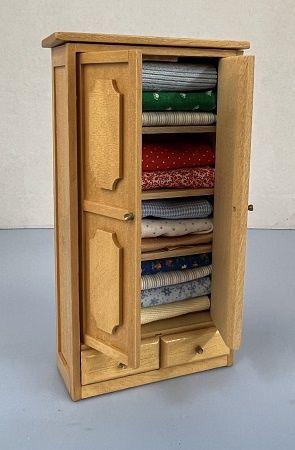 Cabinet Filled With Fabric ch22172