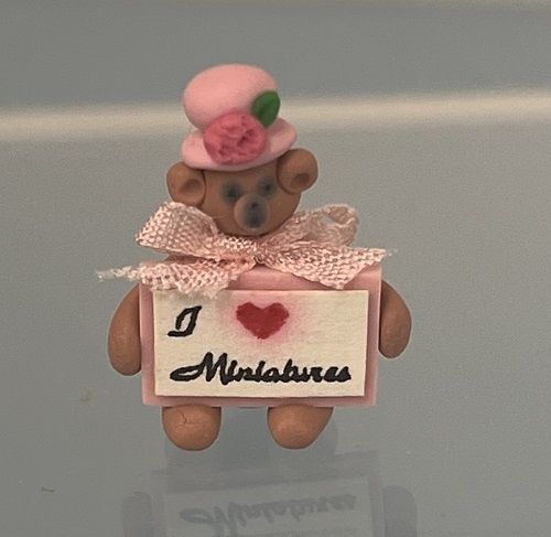 Brown Bear in Pink Hat Holding "I love Miniatures" Sign Bear1D