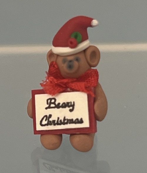 Brown Bear Wearing a Santa Hat Holding 'Beary Christmas' Sign Beary1G