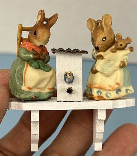 Bunnies and Birdhouse on White Shelf ala1078