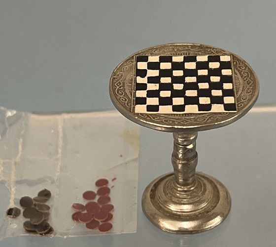 Checkers on a Metal Table MC1840X