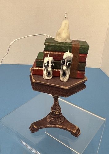 Enchanted Old Table with Candles and Books ala601