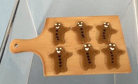 Gingerbread Men Cooling on Board mn184