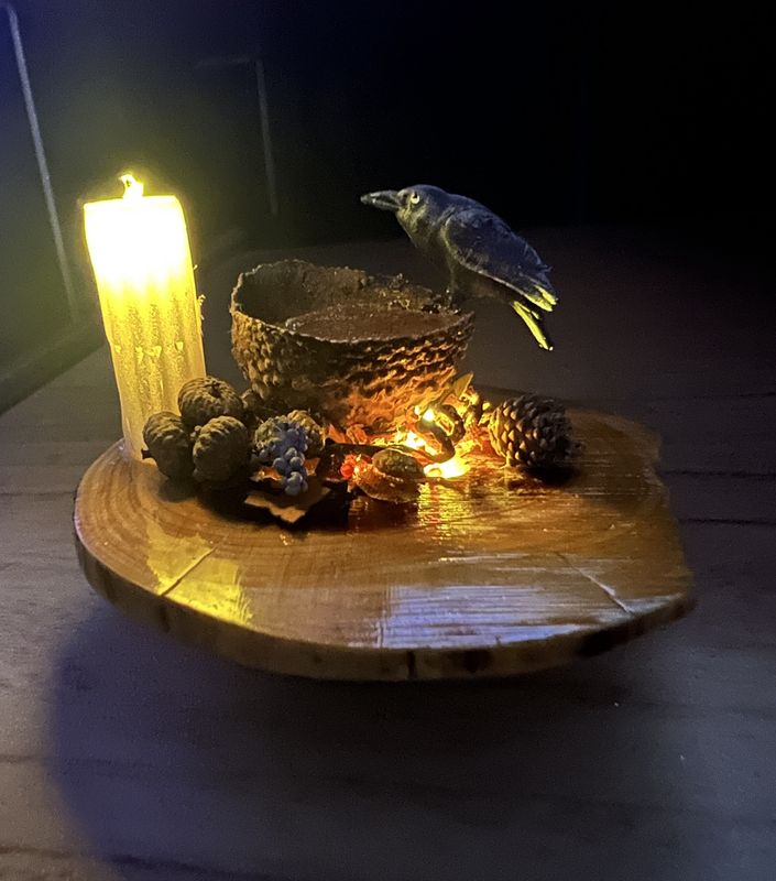 Lighted Tall Candle with Crow Drinking Water on Cedar Table mc1348