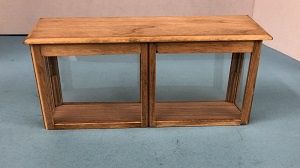Light Wood Cabinet with Hairline Crack in the Plexiglass uk5128