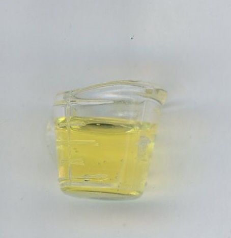 Measuring Cup, Filled with Olive Oil HR54329