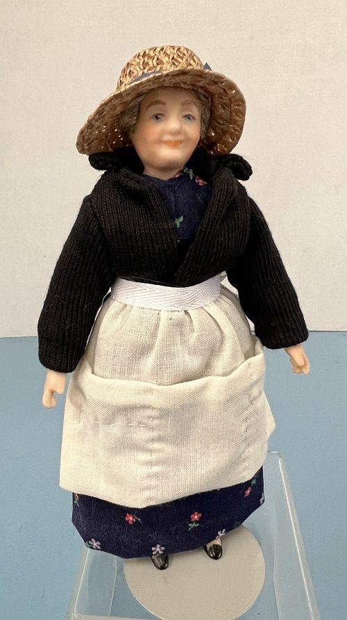 Older Woman with Blue Dress, Apron and Jacket mc031417