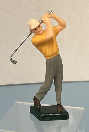 Molded figure with golf club MN569