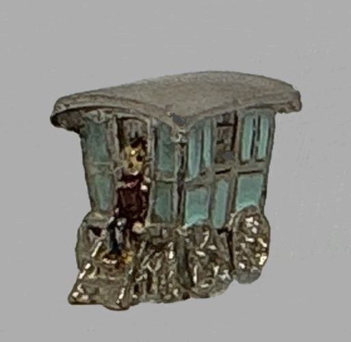 Metal Turquoise Figurine of Painted Stagecoach with Seated Man mc031202