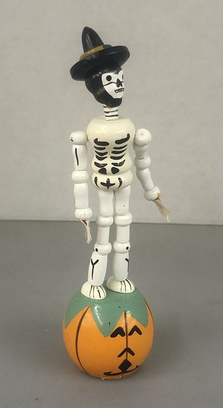 Night of the Dead Skeleton Standing on a Pumpkin mc02956