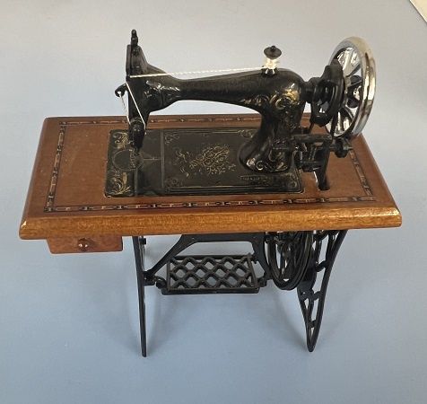Old-Fashioned Treadle Sewing Machine ch22049