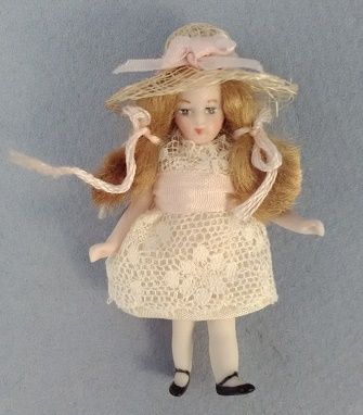 Pig-Tailed Girl in Gardening Hat 551617