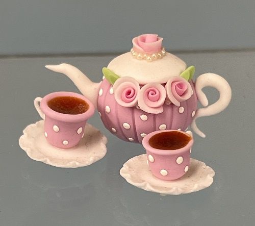 Pink Rose Tea Set with Tea in the Cups mc031699