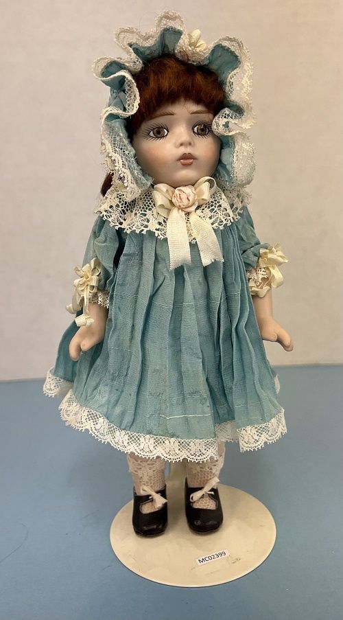 Porcelain 8" Doll in Blue Silk mc02399