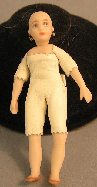 Porcelain Doll with Leather Body MCT0045
