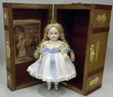 Porcelain Doll with Trunk 10000165-1