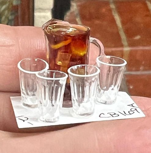 Pitcher of sweet tea and four glasses cb169a