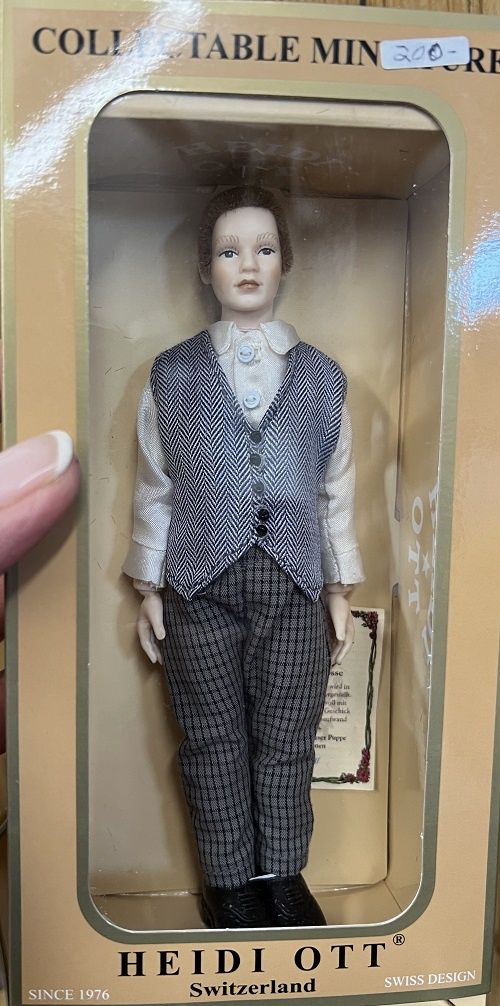 Red haired man doll dressed in plaid pants, blue vest, white shirt x109