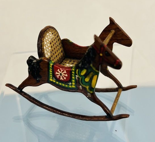 Rocking Horse with caned seat and backrest a55501