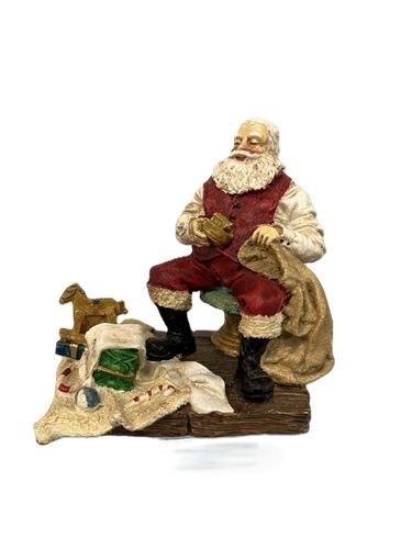 Santa Loading his Bag with Toys gg102309