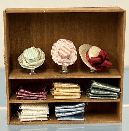 Shelves with Hats and Fabric mc05555