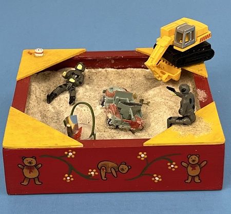 Sandbox full of boy toys sandbox