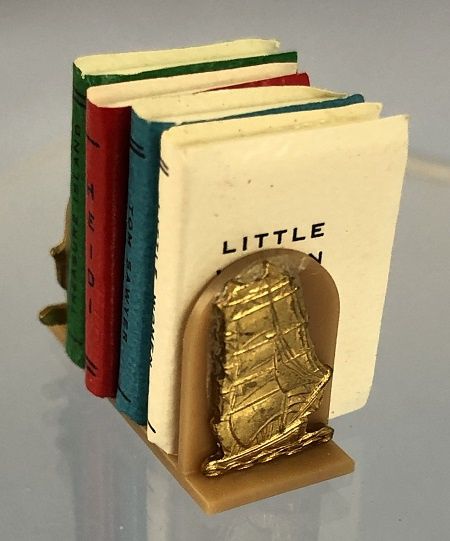 Sail Boat bookends with four books mc03638