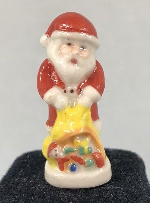 Santa pouring out toys from bag Chri4