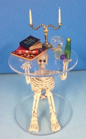 Skeleton Holding up table rdhal03